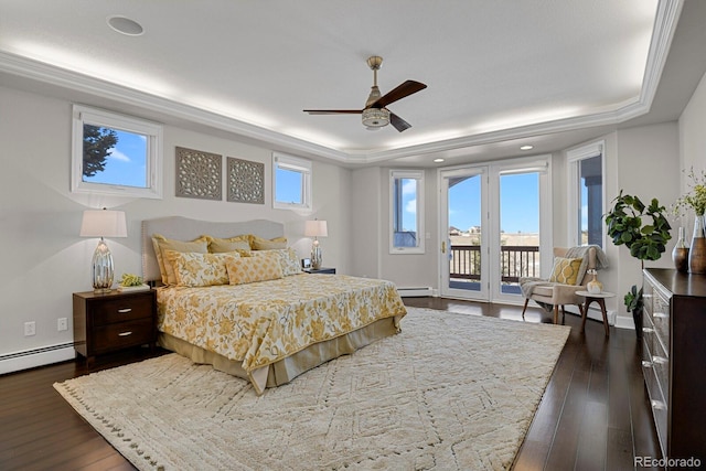 bedroom featuring access to exterior, ceiling fan, dark hardwood / wood-style flooring, and multiple windows