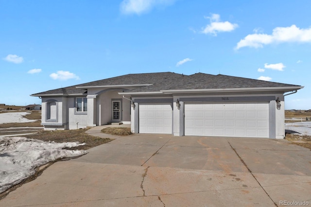 ranch-style house with driveway, roof with shingles, an attached garage, and stucco siding