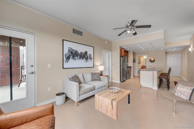 1975 Grant St Unit 501, Denver, CO 80203 - living room featuring crown molding and ceiling fan