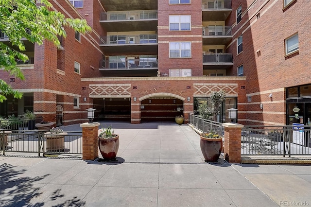 1975 Grant St Unit 501, Denver, CO 80203 - view of apartment building / complex with a garage