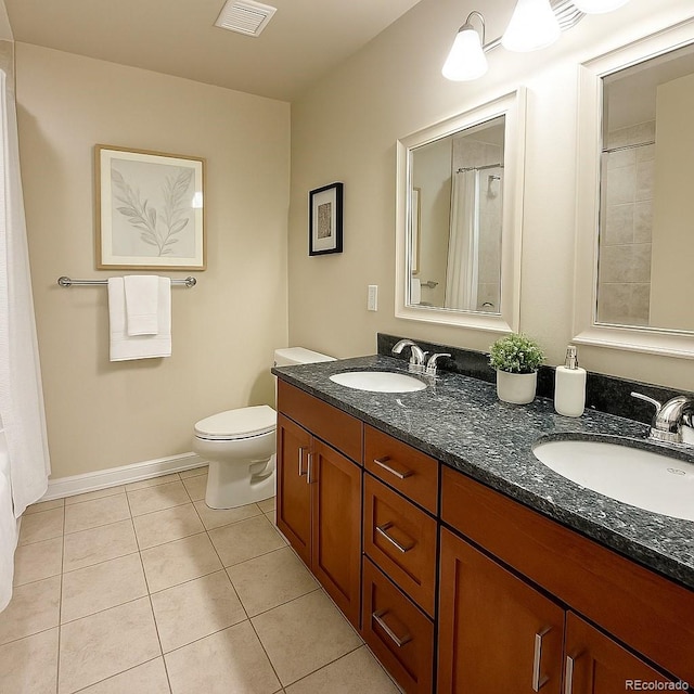 1975 Grant St Unit 501, Denver, CO 80203 - full bathroom with tile patterned flooring and double vanity