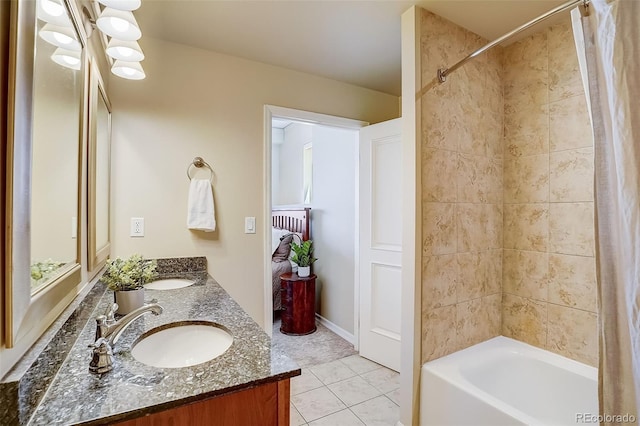 1975 Grant St Unit 501, Denver, CO 80203 - bathroom featuring double vanity, shower / bath combination with curtain, and tile patterned floors