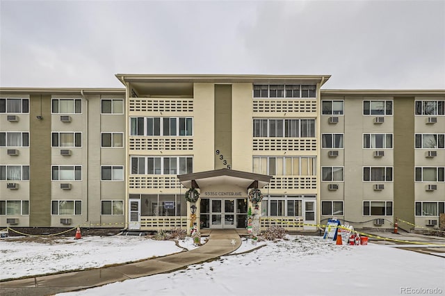 view of snow covered property