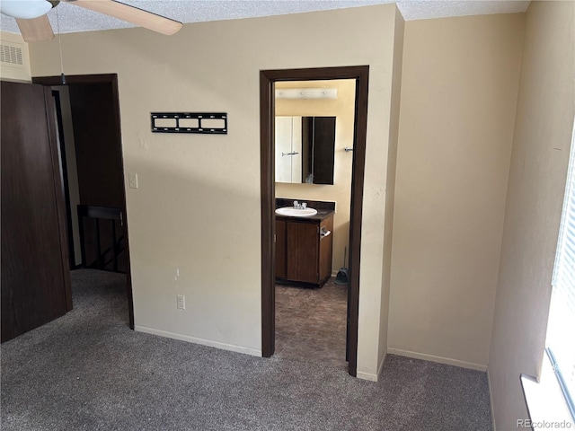 1967 S Oakland Way, Aurora, CO 80014 - corridor with a sink, carpet, and baseboards