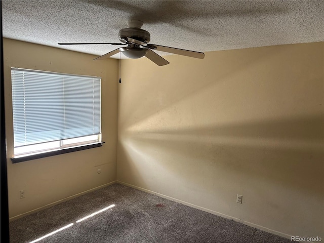1967 S Oakland Way, Aurora, CO 80014 - spare room featuring ceiling fan, a textured ceiling, carpet, and baseboards