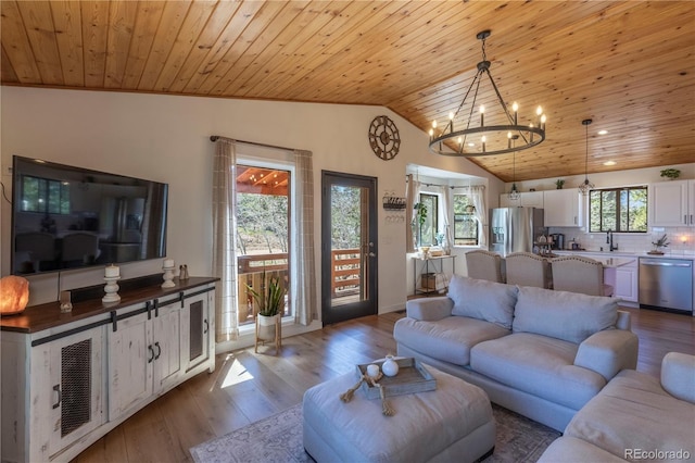 51 Schooley Rd, Bailey, CO 80421 - living room with a chandelier, wooden ceiling, lofted ceiling, wood finished floors, and recessed lighting