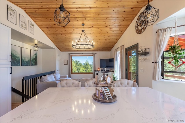 51 Schooley Rd, Bailey, CO 80421 - dining space featuring vaulted ceiling, wooden ceiling, and a chandelier