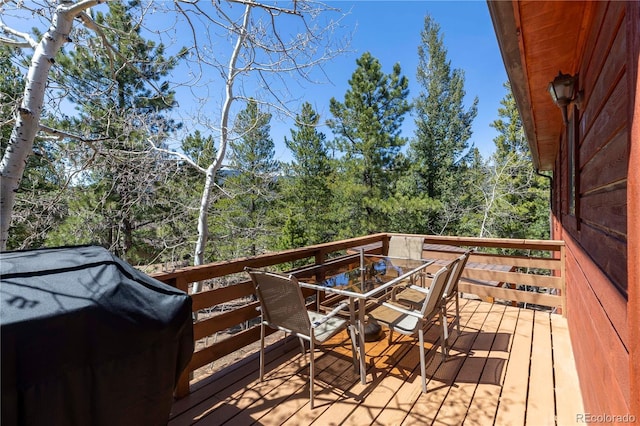 51 Schooley Rd, Bailey, CO 80421 - wooden deck featuring outdoor dining space and grilling area