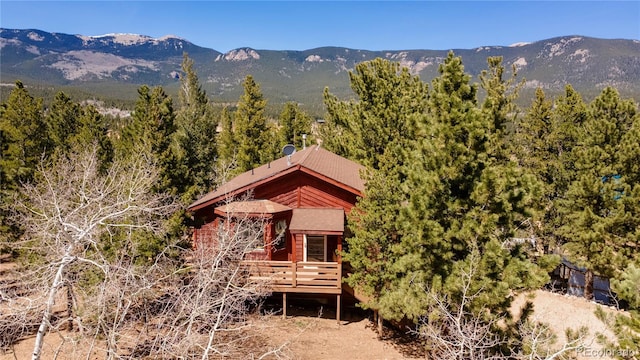 51 Schooley Rd, Bailey, CO 80421 - back of property with a deck with mountain view