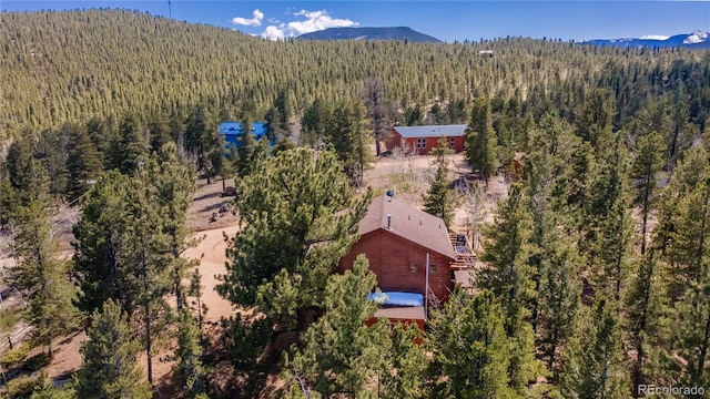 51 Schooley Rd, Bailey, CO 80421 - aerial view of property and surrounding area with a forest and a mountain backdrop