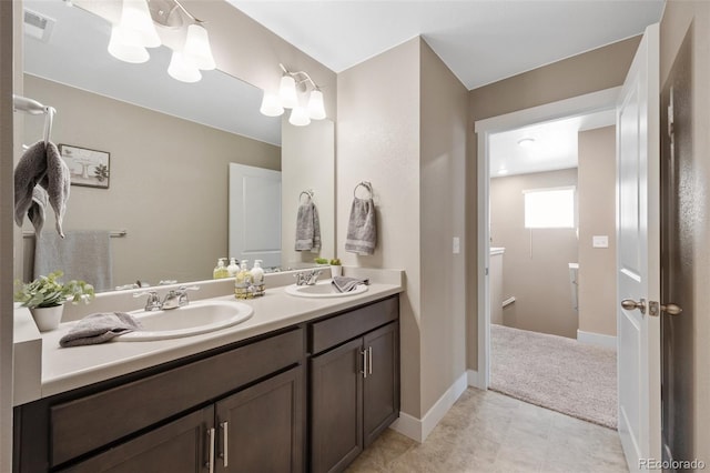 bathroom with double vanity