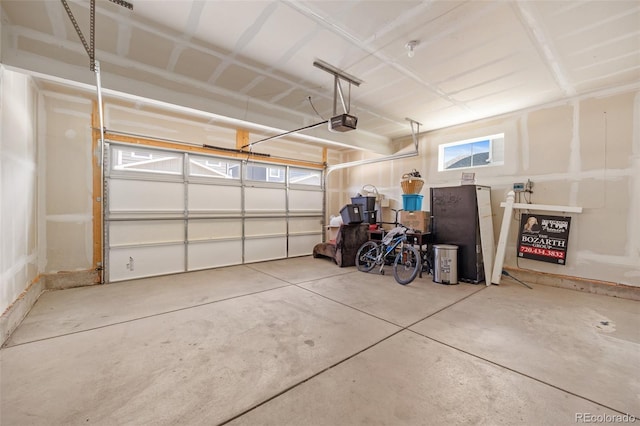 garage featuring a garage door opener