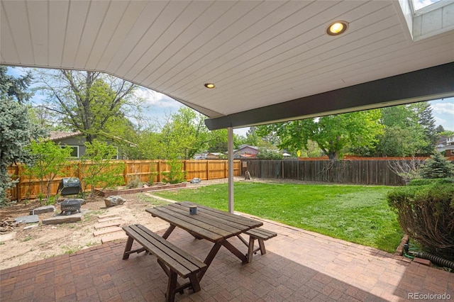 view of patio / terrace featuring outdoor dining area and a fire pit