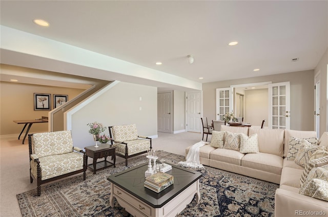 living room with carpet, baseboards, and recessed lighting