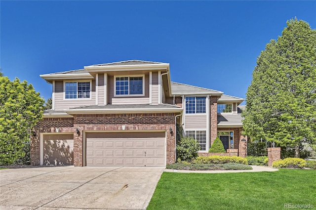 10529 Dacre Pl, Lone Tree, CO 80124 - view of front facade with an attached garage, brick siding, driveway, and a front yard