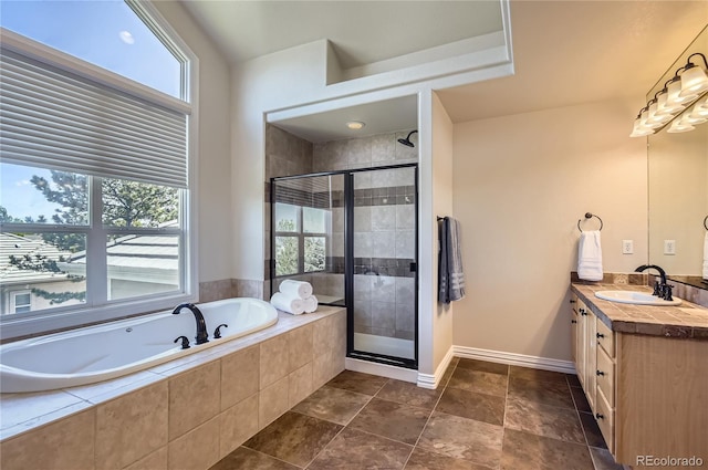 10529 Dacre Pl, Lone Tree, CO 80124 - full bathroom featuring a bath, vanity, a stall shower, and plenty of natural light