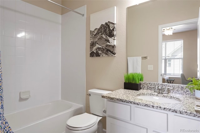 bathroom with vanity, toilet, and shower / bath combination with curtain