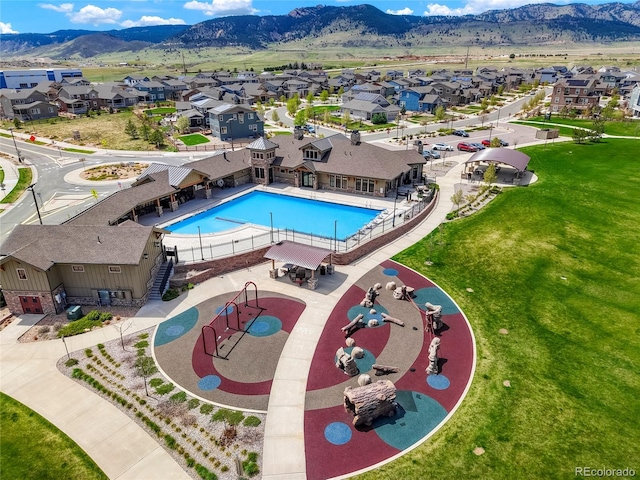 view of pool featuring a mountain view and a residential view
