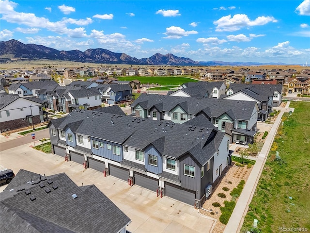 aerial view with a residential view and a mountain view