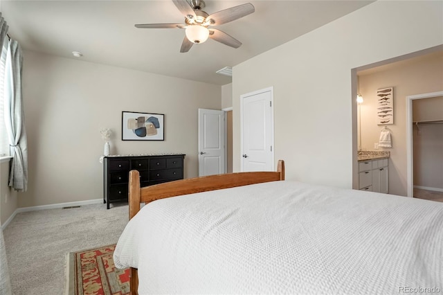 bedroom featuring carpet flooring, visible vents, baseboards, and a ceiling fan