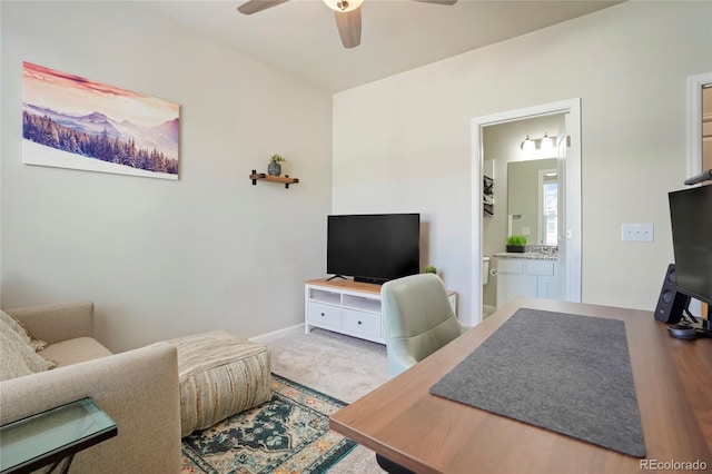 living room with a ceiling fan and carpet floors