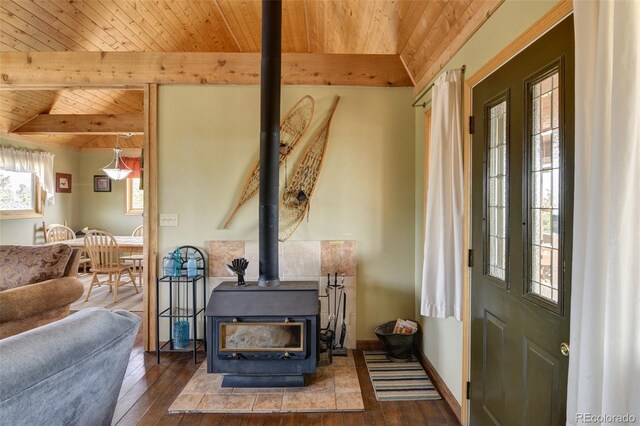 3750 Singletree Rd, Hartsel, CO 80449 - living room with hardwood / wood-style flooring, a wood stove, and wooden ceiling