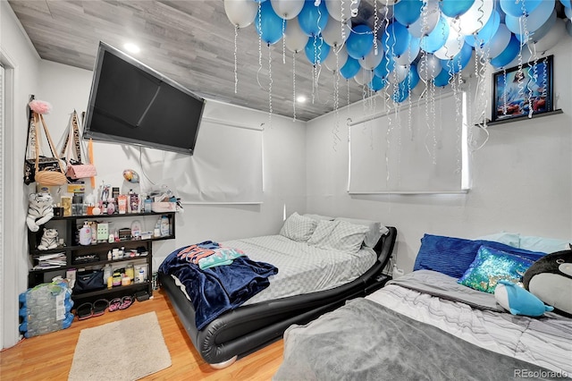 bedroom featuring wood-type flooring