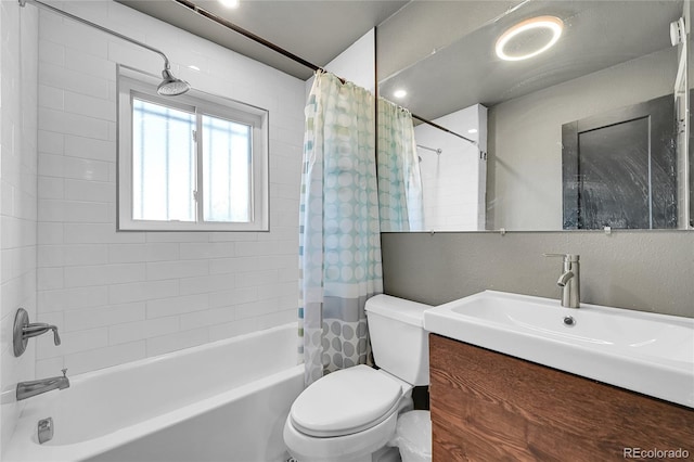 full bathroom with vanity, toilet, and shower / bath combo with shower curtain