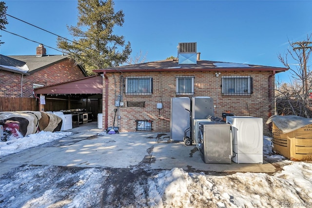 view of snow covered property