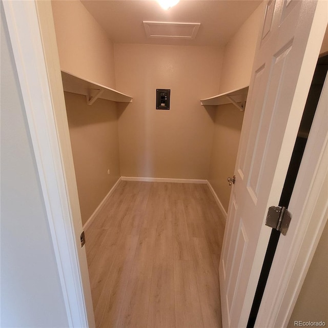 755 S Clinton St Unit 6B, Denver, CO 80247 - spacious closet with attic access and light wood-style flooring