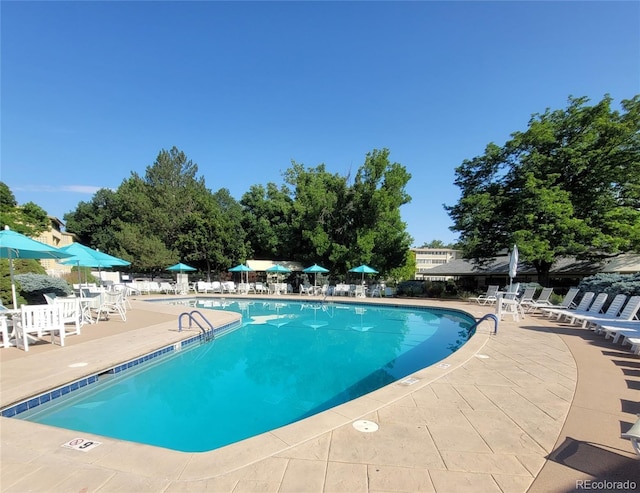 755 S Clinton St Unit 6B, Denver, CO 80247 - community pool with a patio area