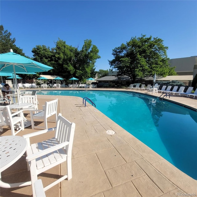 755 S Clinton St Unit 6B, Denver, CO 80247 - community pool with a patio