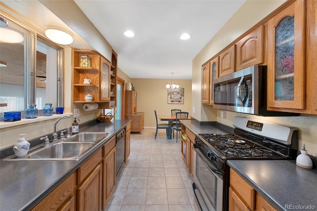 kitchen featuring open shelves, a sink, stainless steel appliances, glass insert cabinets, and dark countertops