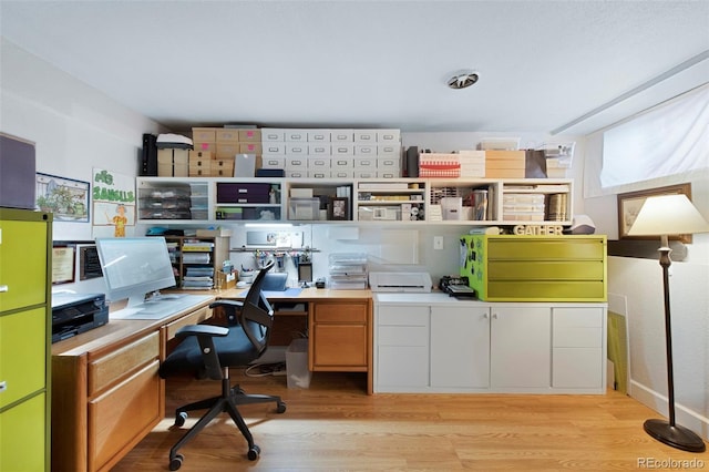 office area featuring light wood finished floors