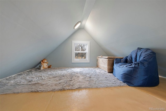 bedroom featuring vaulted ceiling