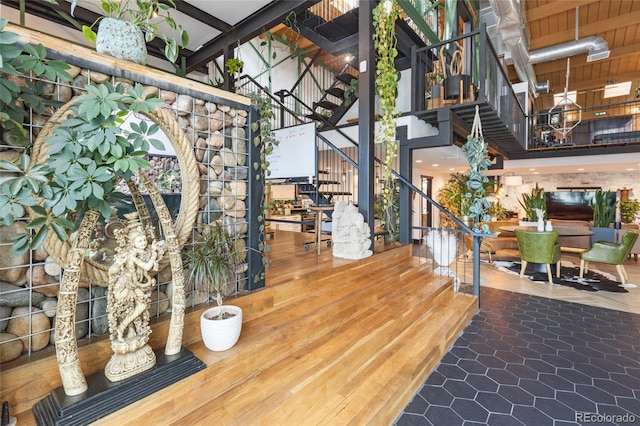 1203 24th St, Denver, CO 80205 - building lobby featuring stairs and a high ceiling