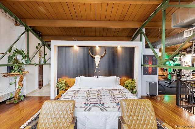 1203 24th St, Denver, CO 80205 - bedroom featuring wood finished floors and wooden ceiling with exposed beams