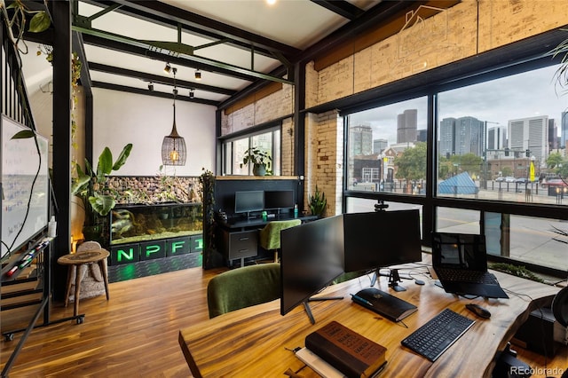 1203 24th St, Denver, CO 80205 - office with wood finished floors, healthy amount of natural light, beamed ceiling, and a towering ceiling
