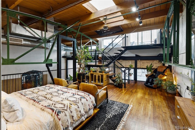 1203 24th St, Denver, CO 80205 - bedroom featuring a wooden ceiling with exposed beams and hardwood / wood-style flooring