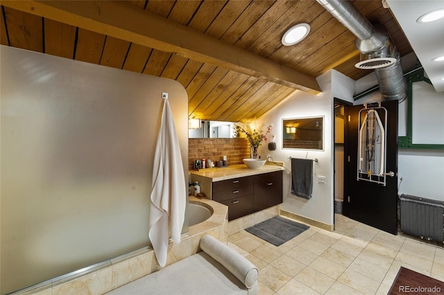 1203 24th St, Denver, CO 80205 - kitchen with radiator, wooden ceiling, recessed lighting, light tile patterned floors, and light countertops