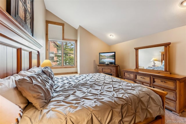bedroom featuring vaulted ceiling