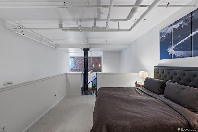 bedroom featuring carpet