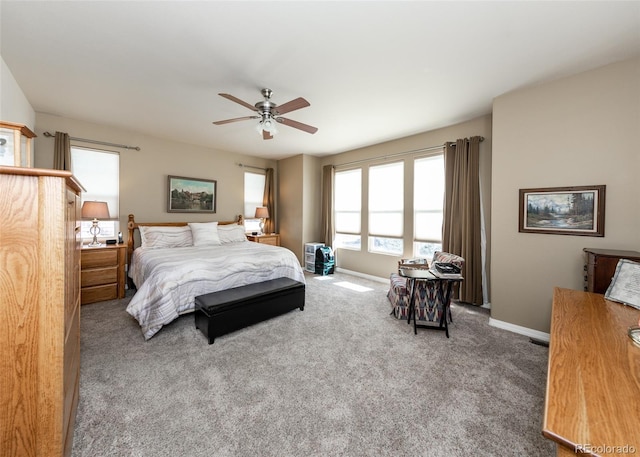 5279 Mount Cutler Ct, Colorado Springs, CO 80924 - carpeted bedroom with baseboards and ceiling fan