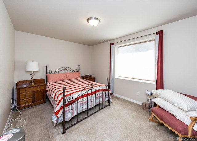 5279 Mount Cutler Ct, Colorado Springs, CO 80924 - bedroom with baseboards and light carpet