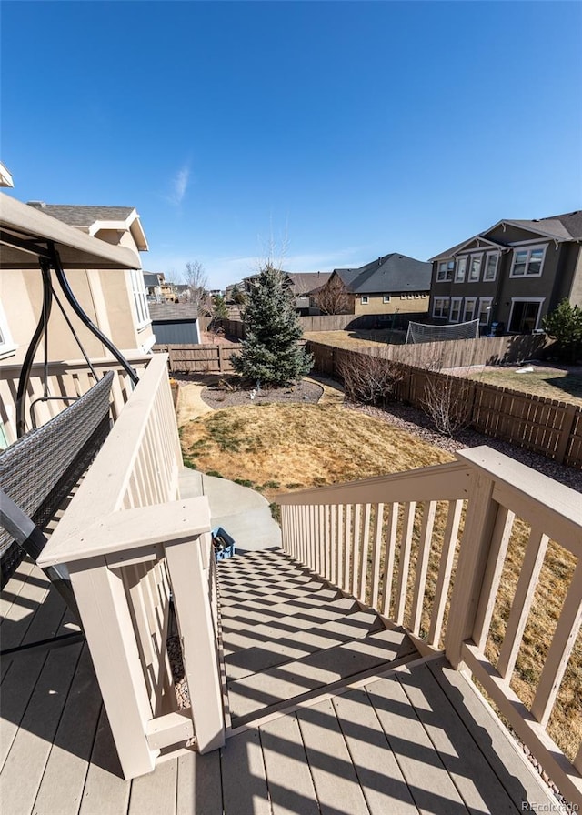 5279 Mount Cutler Ct, Colorado Springs, CO 80924 - deck with a residential view, a fenced backyard, and a patio area