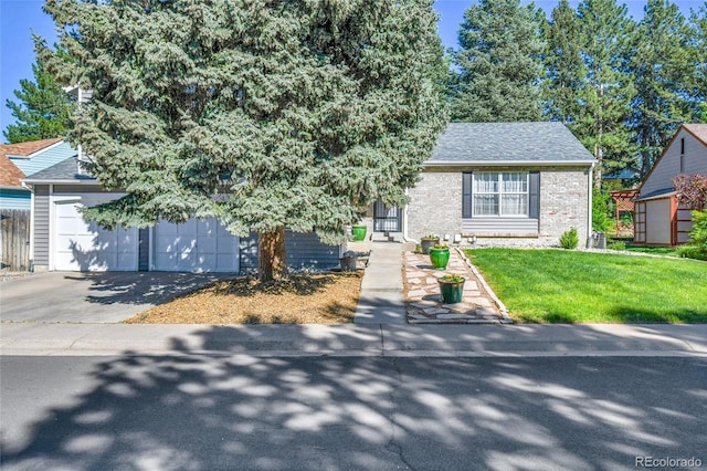 4782 E Costilla Ave, Centennial, CO 80122 - view of front facade with asphalt driveway, a front yard, and roof with shingles