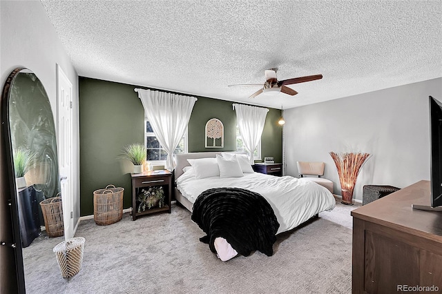 4782 E Costilla Ave, Centennial, CO 80122 - carpeted bedroom featuring ceiling fan, a textured ceiling, and baseboards