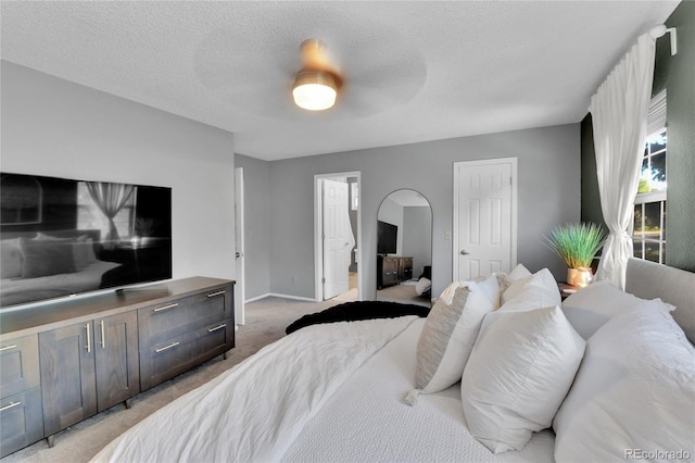 4782 E Costilla Ave, Centennial, CO 80122 - bedroom featuring light colored carpet, baseboards, a ceiling fan, and a textured ceiling