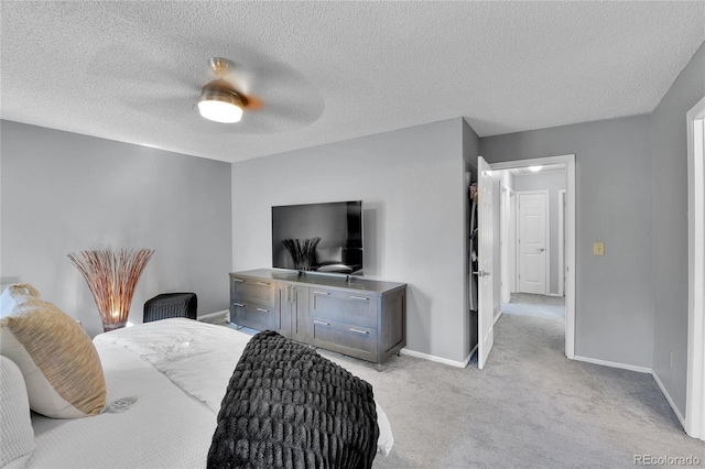 4782 E Costilla Ave, Centennial, CO 80122 - bedroom with light carpet, baseboards, ceiling fan, and a textured ceiling