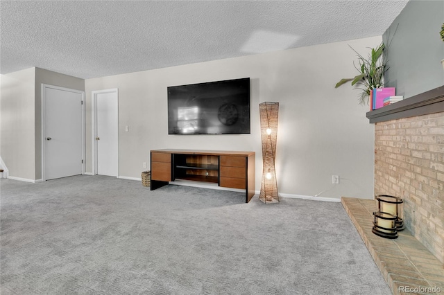 4782 E Costilla Ave, Centennial, CO 80122 - unfurnished living room featuring a textured ceiling, carpet floors, and baseboards